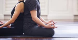 Couple's yoga class, meditation back to back